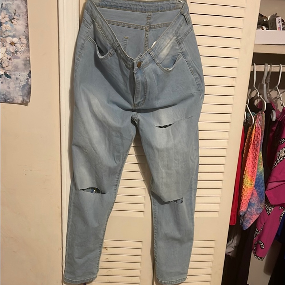 Women's Light Blue Distressed Jeans